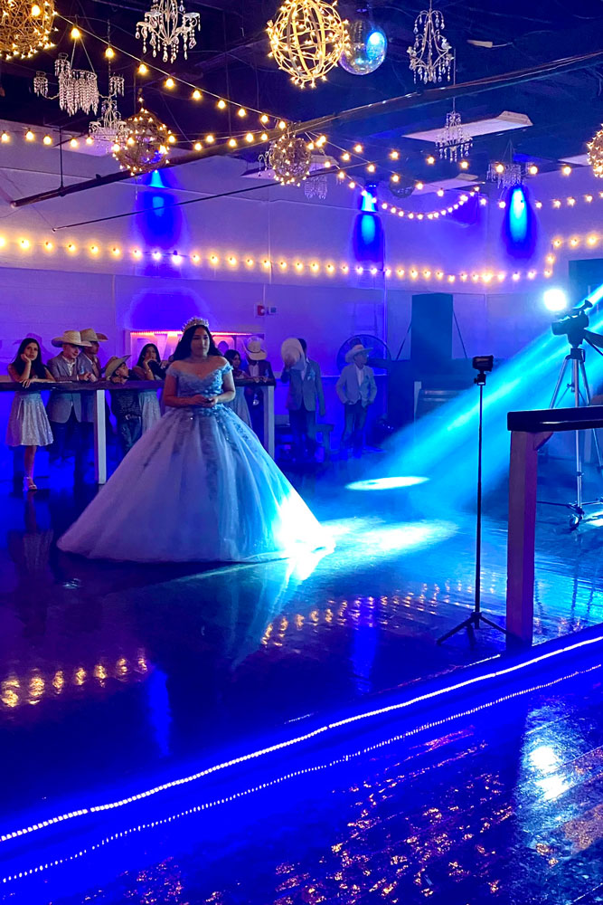 Quinceanera girl with family just prior to crown presentation