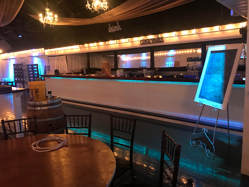 Bar lighting that matches the rest of the room and accents the area