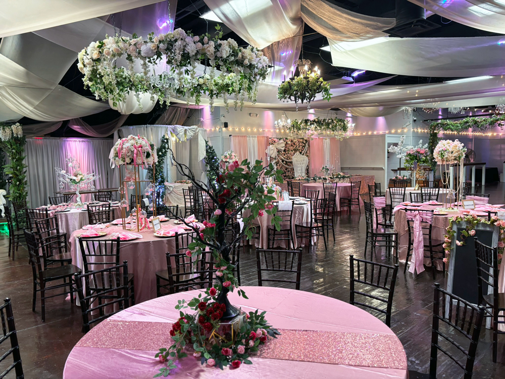 Decorative garden chandelier suspended installation in the center of the ballroom