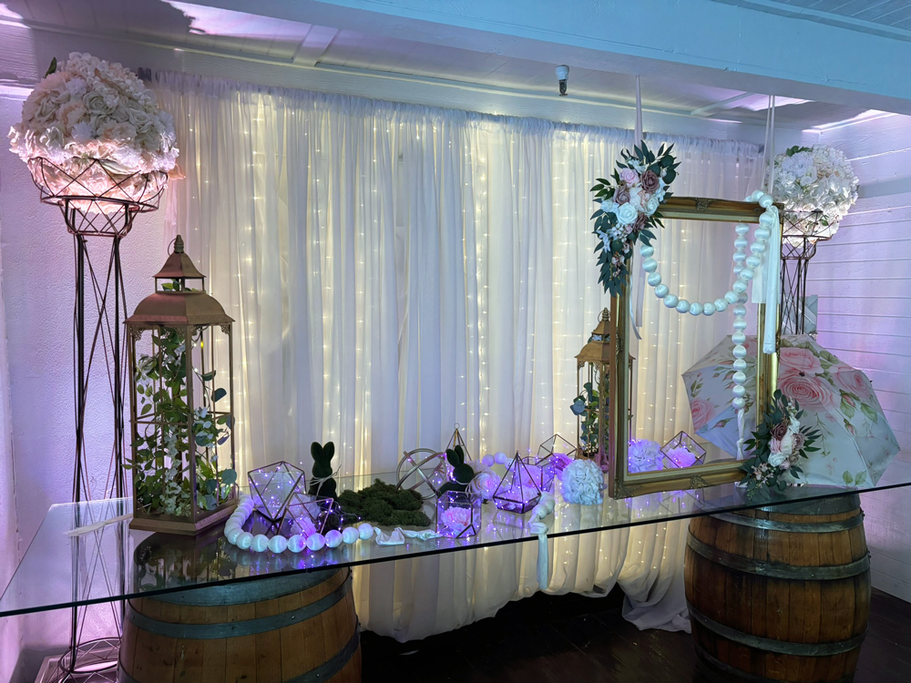 Glass-top display table for sign in table or person of honor display, or family photos