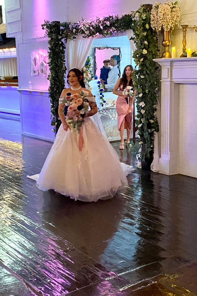 Guests arriving through the grand entrance at The Chateau at Forest Park for a formal celebration